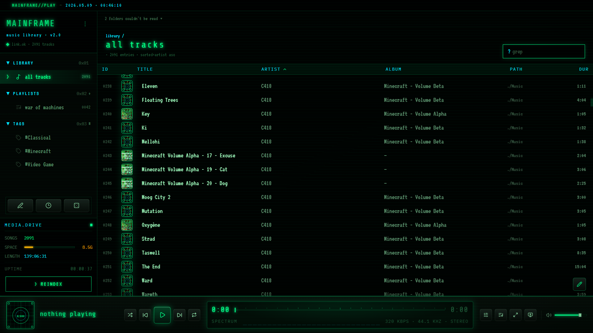 T-Player MAINFRAME theme showing music library